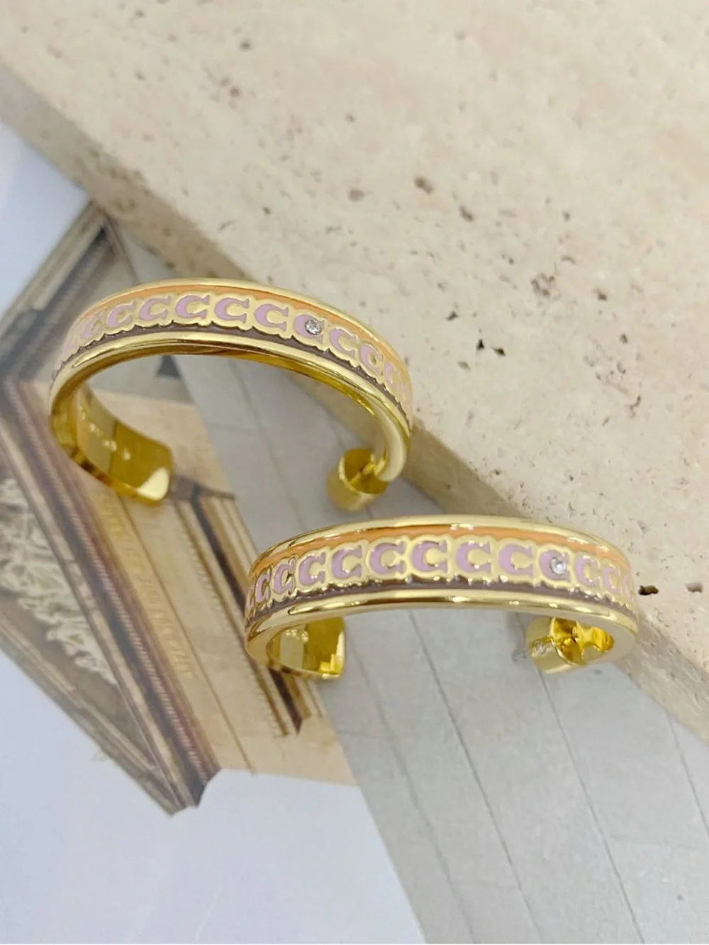 Coach Gold Hoop Earrings with Light Pink Enamel Accents